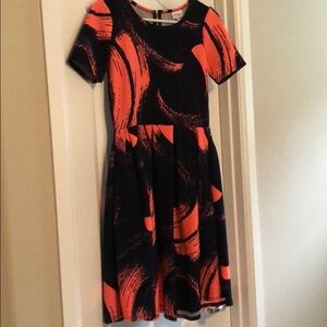 Navy/peach lularoe dress. Zip up with pleats.